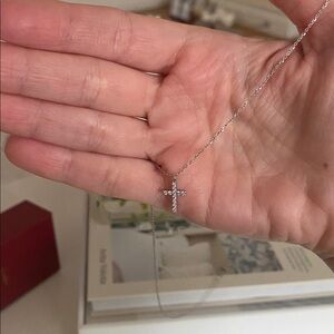 14 K WHITE GOLD DIAMOND CROSS NECKLACE 
Length 18in